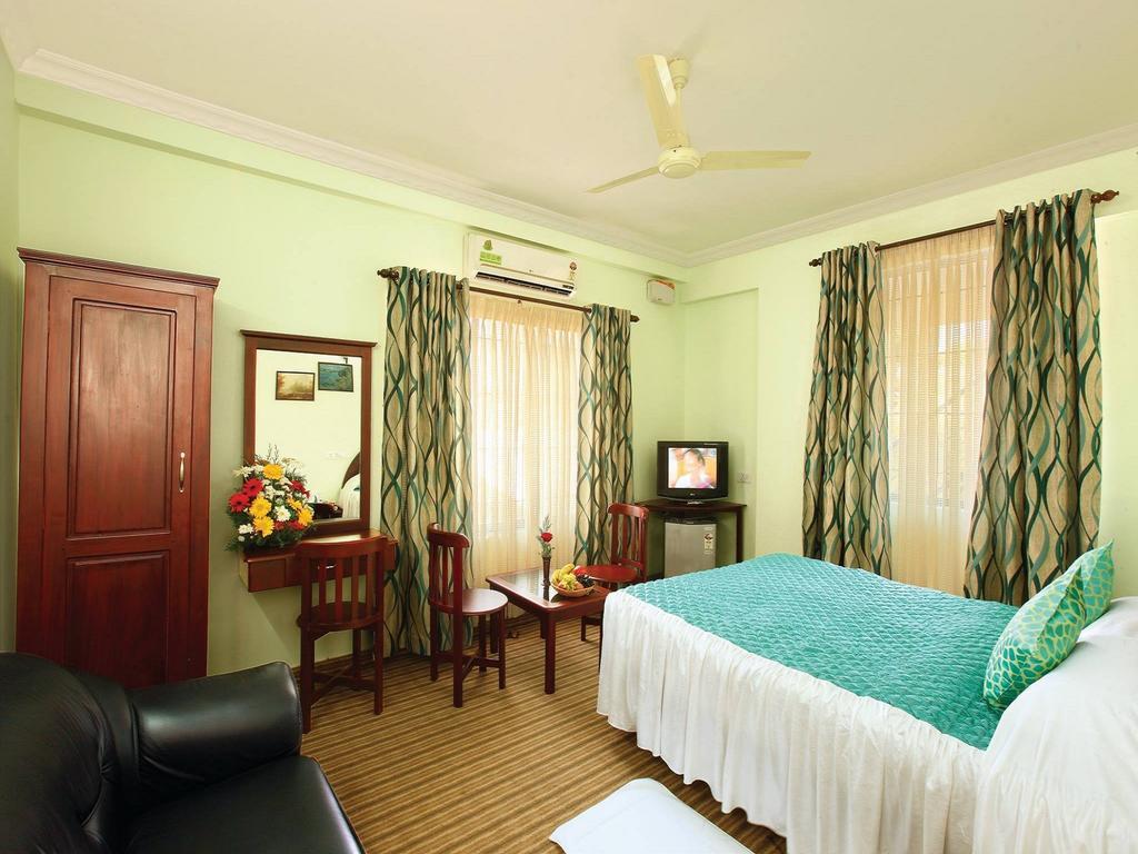 Sm Regency Kochi Quarto foto